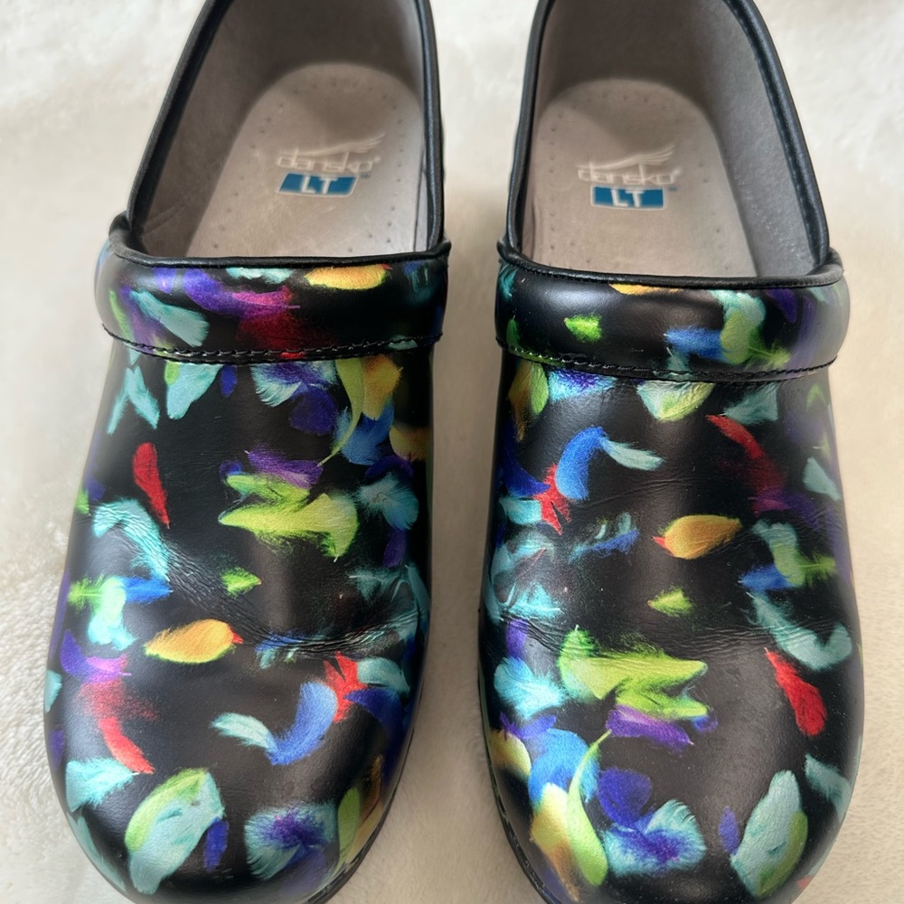 Dansko Black Mules with Striking Geometric Pattern